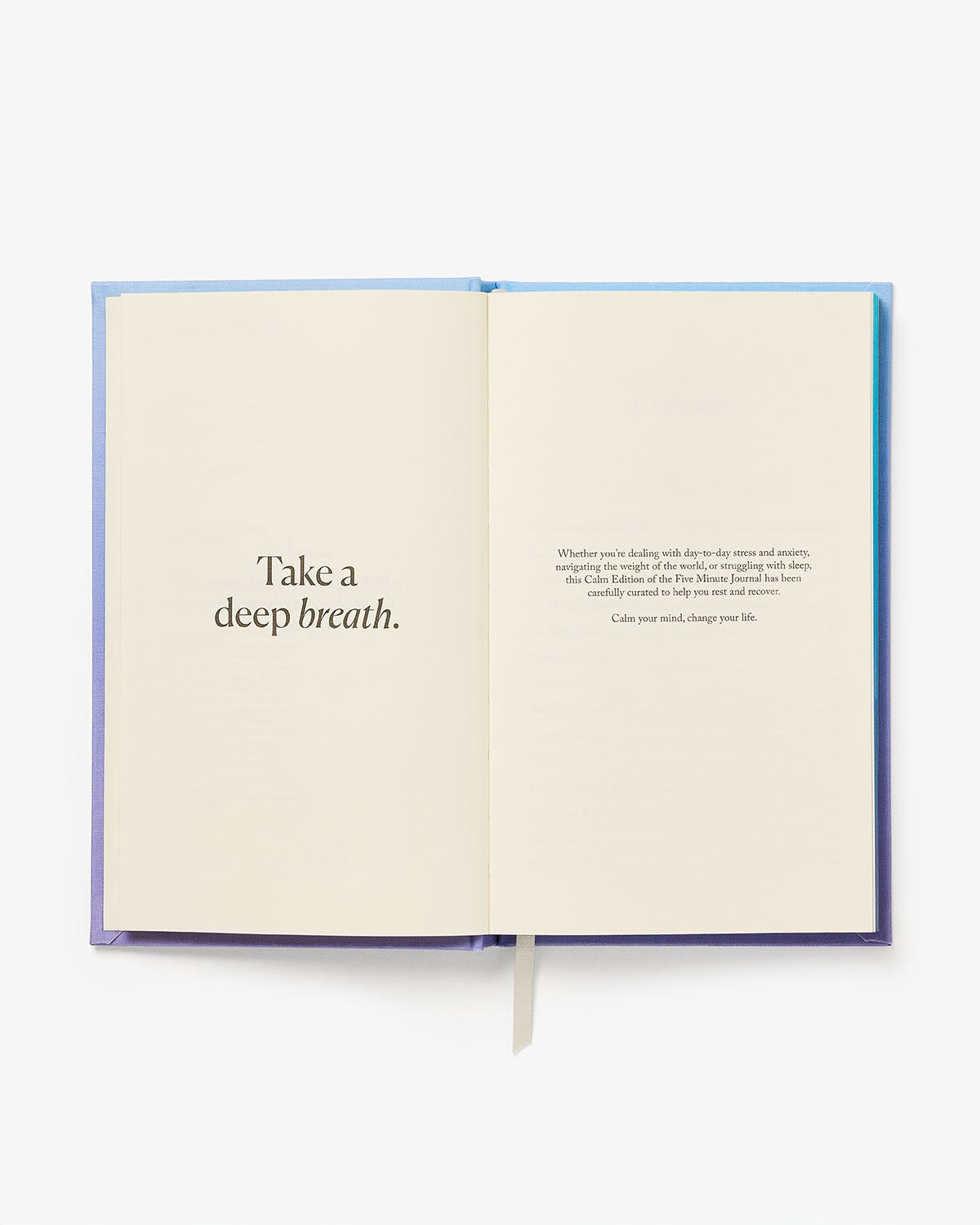 Calm x The Five Minute Journal mindfulness book by Intelligent Change, featuring a clean cover design and journaling pages.