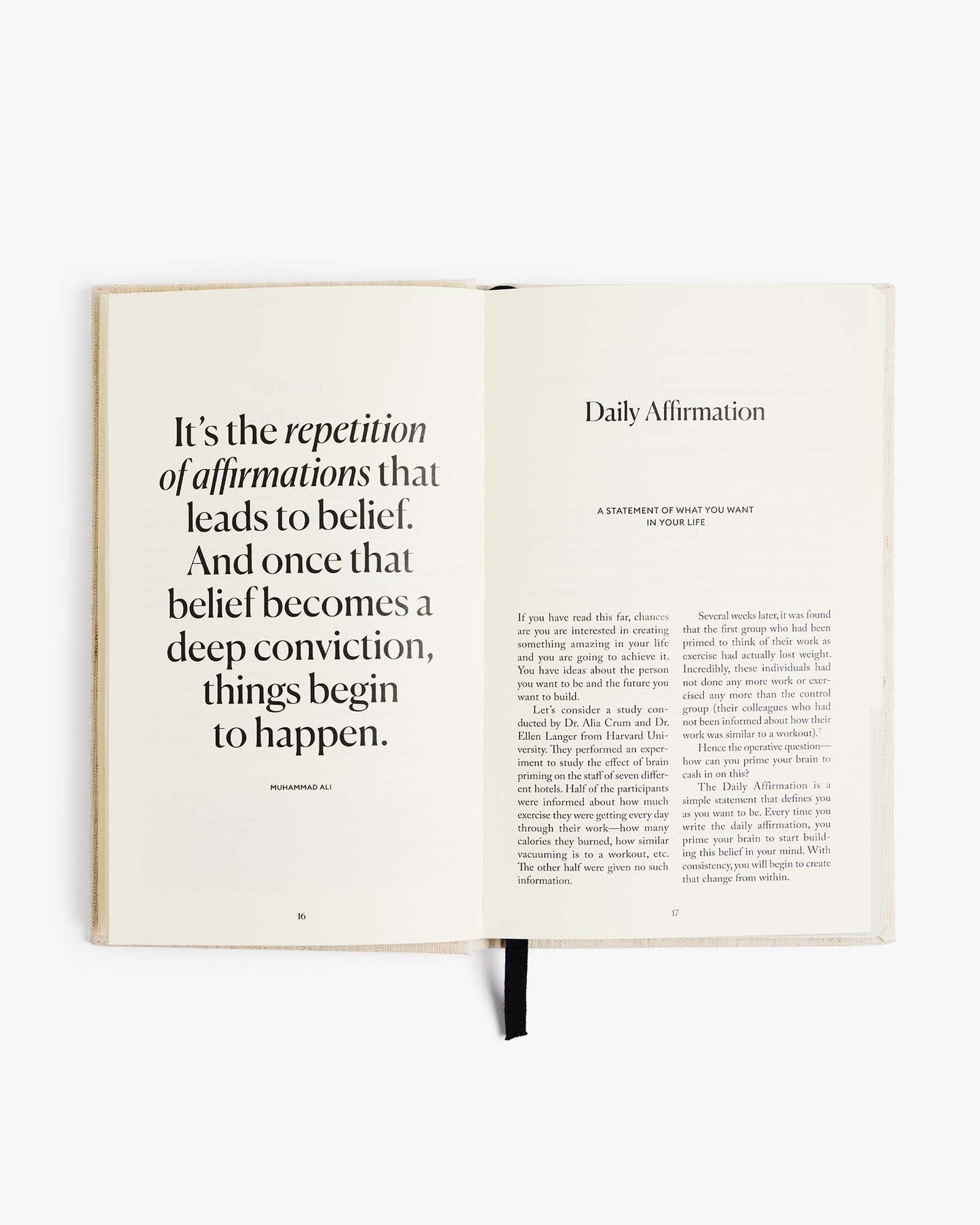 The Five Minute Journal by Intelligent Change in linen cover, featuring a minimalist mindfulness journal with lined pages.