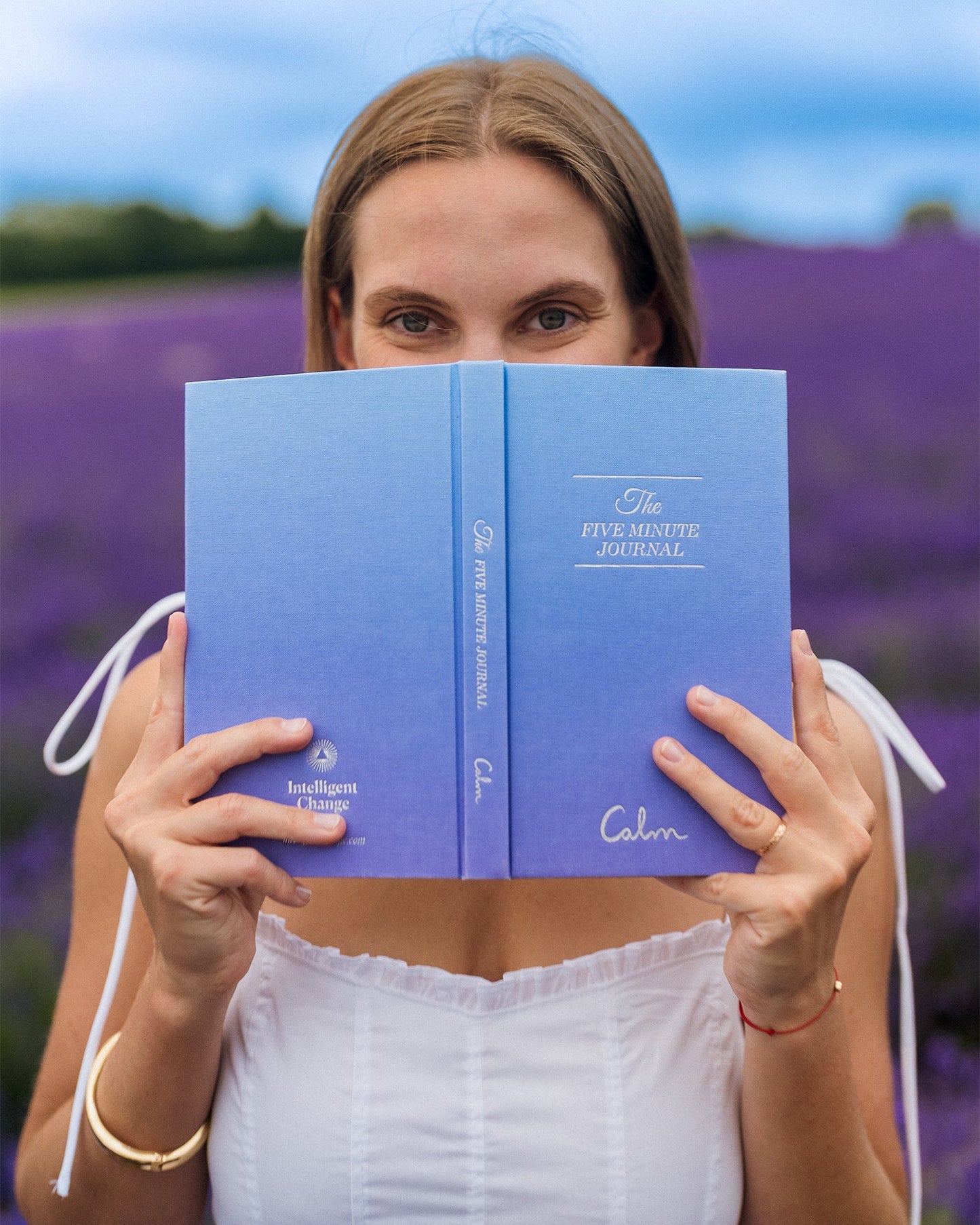 Close-up of the Calm x The Five Minute Journal, a mindfulness journal by Intelligent Change with a sleek cover design.