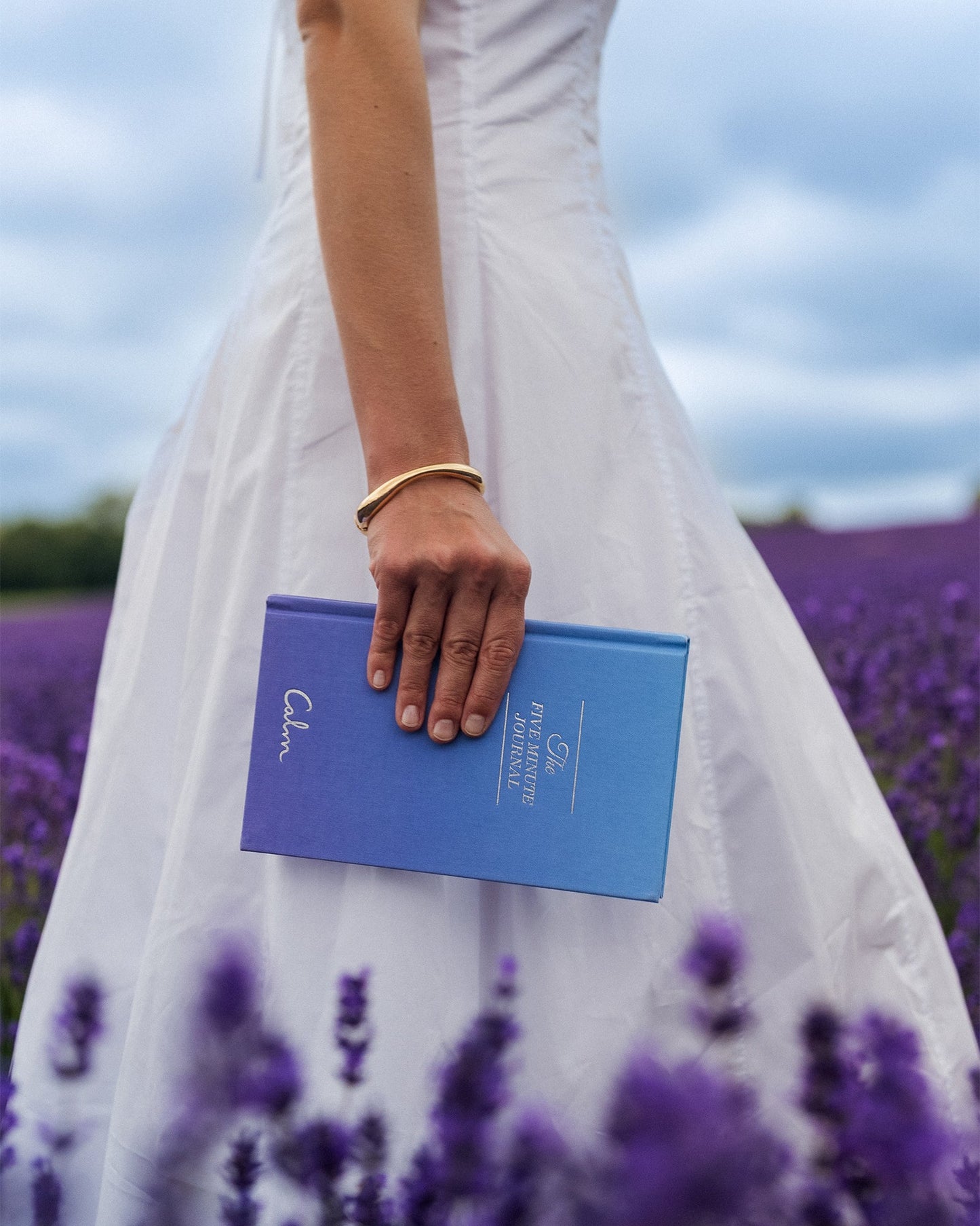 Intelligent Change Calm x The Five Minute Journal for mindfulness, featuring a sleek journal with calming design and inspirational prompts.