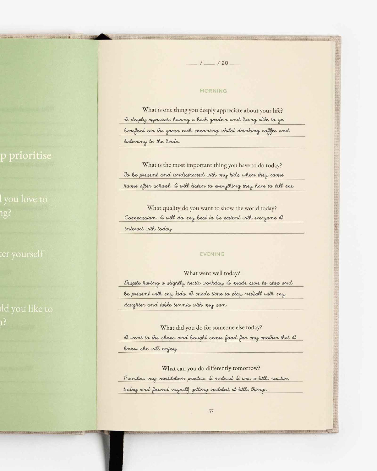Intelligent Change Three Question Journal for mindfulness, featuring a clean design with the journal open on a wooden surface.