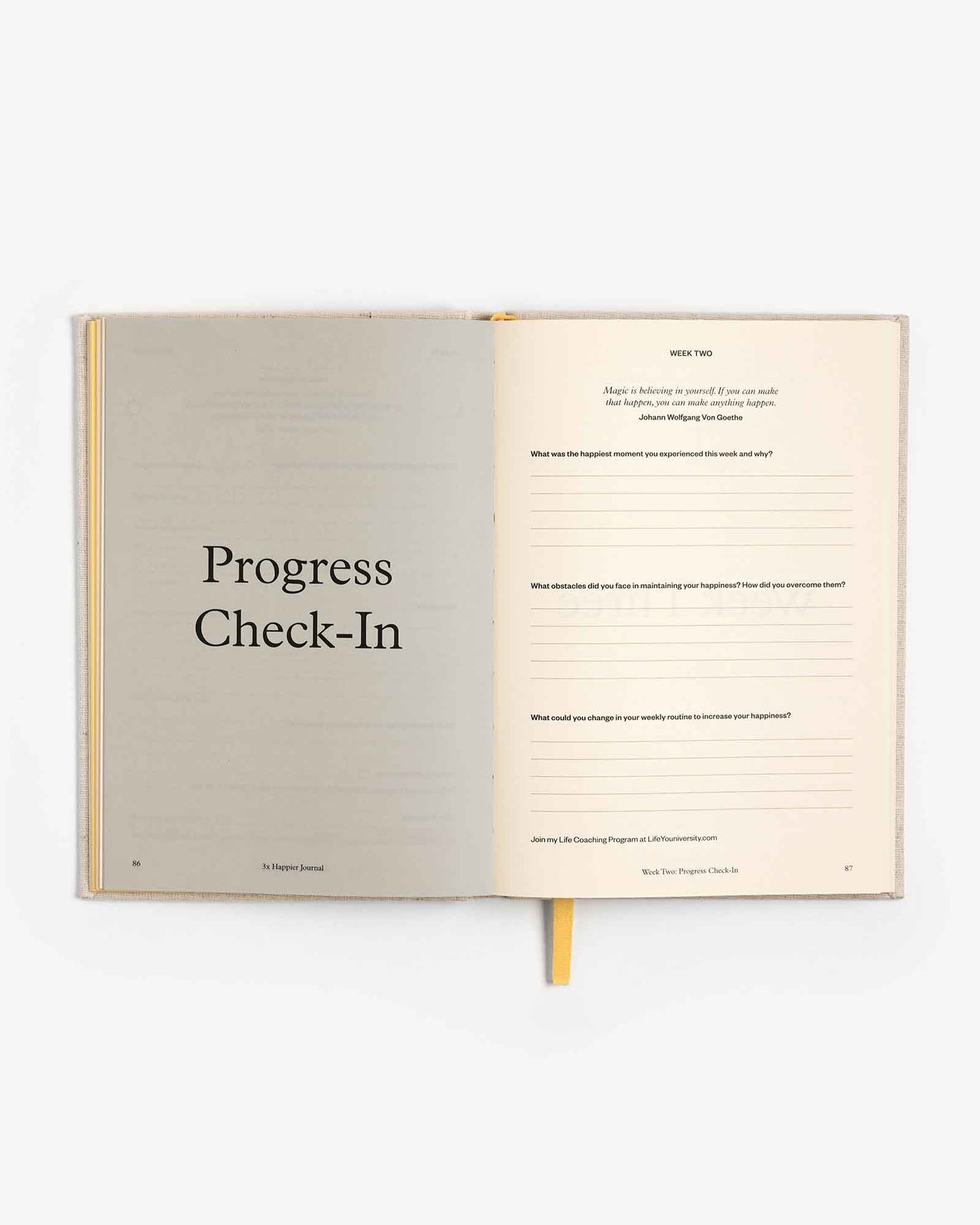 Open 3x Happier Journal by Intelligent Change with pages for daily reflections and gratitude in a sleek, minimalist design.