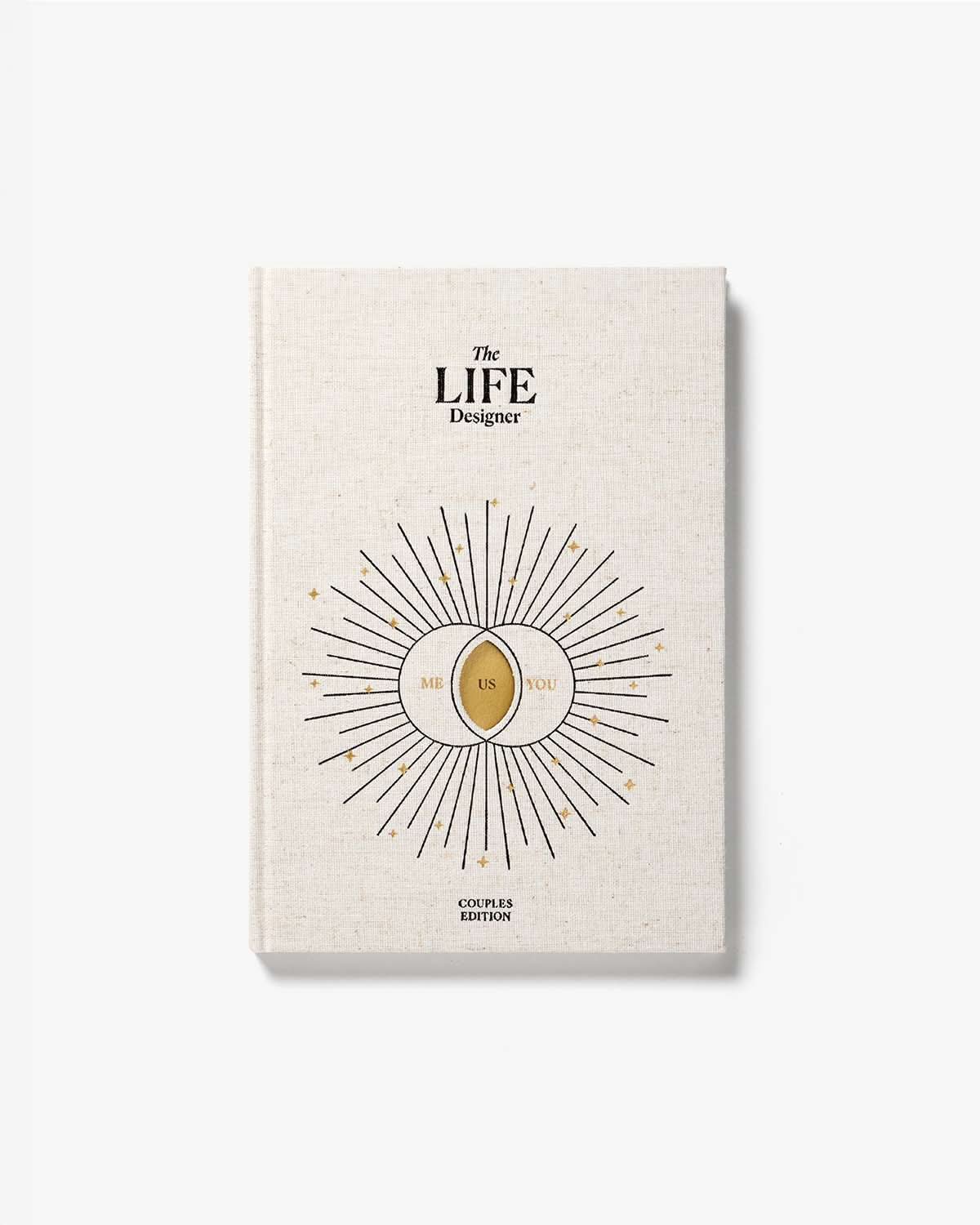 Intelligent Change Life Designer Journal for Couples with a hardcover and open pages for planning and reflection.