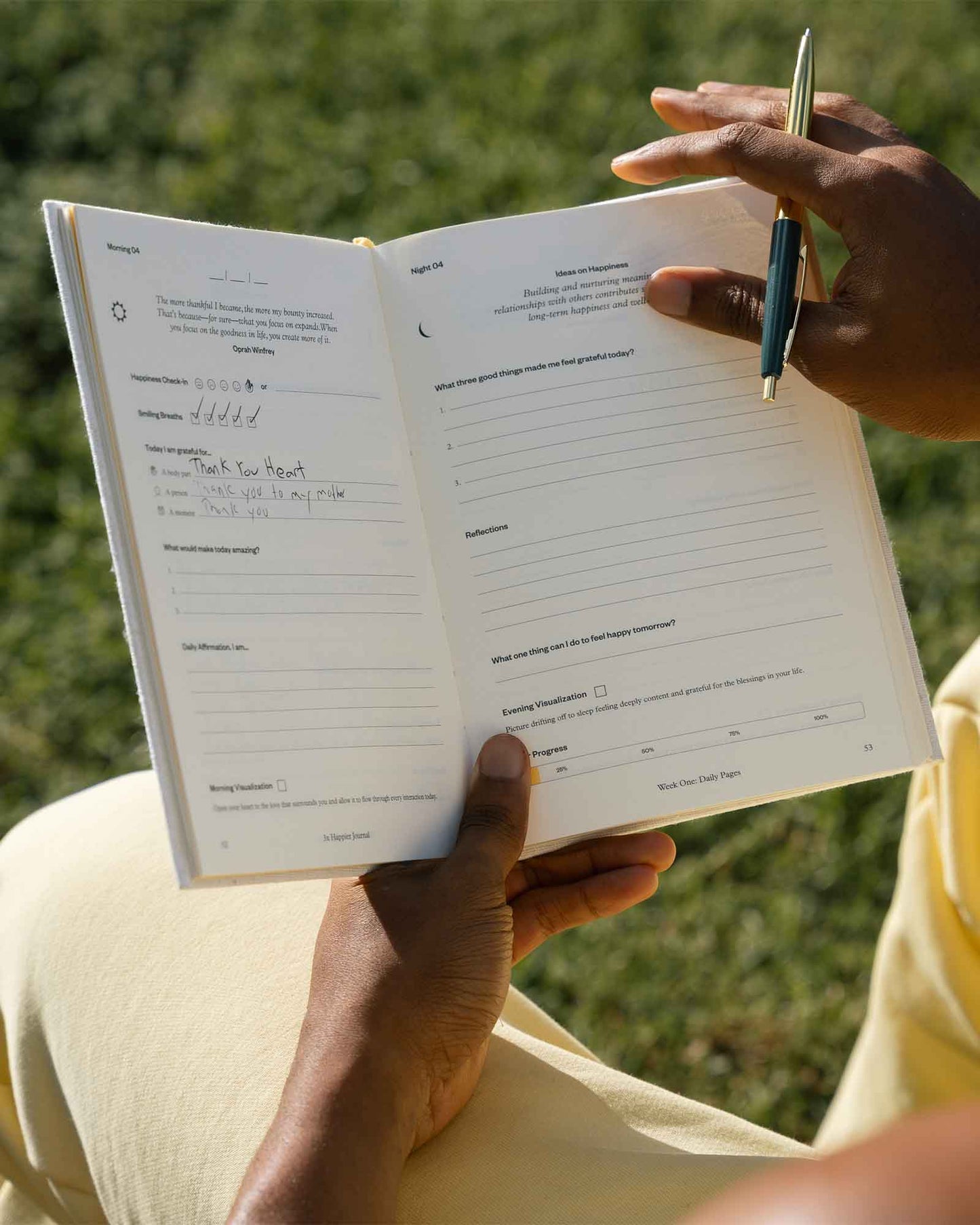 A 3x Happier Journal by Intelligent Change, featuring a sleek closed journal with a minimalist design, on a white background.