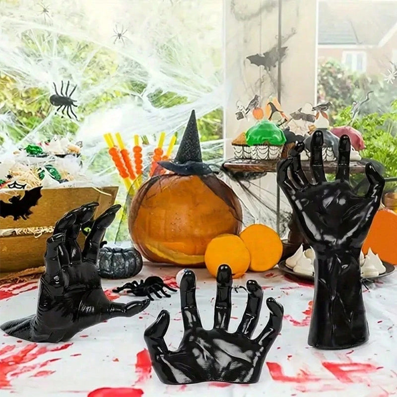 Gothic Halloween indoor decor with 12 bat wall stickers, spooky hands, and lit candles for gothic-themed walls.