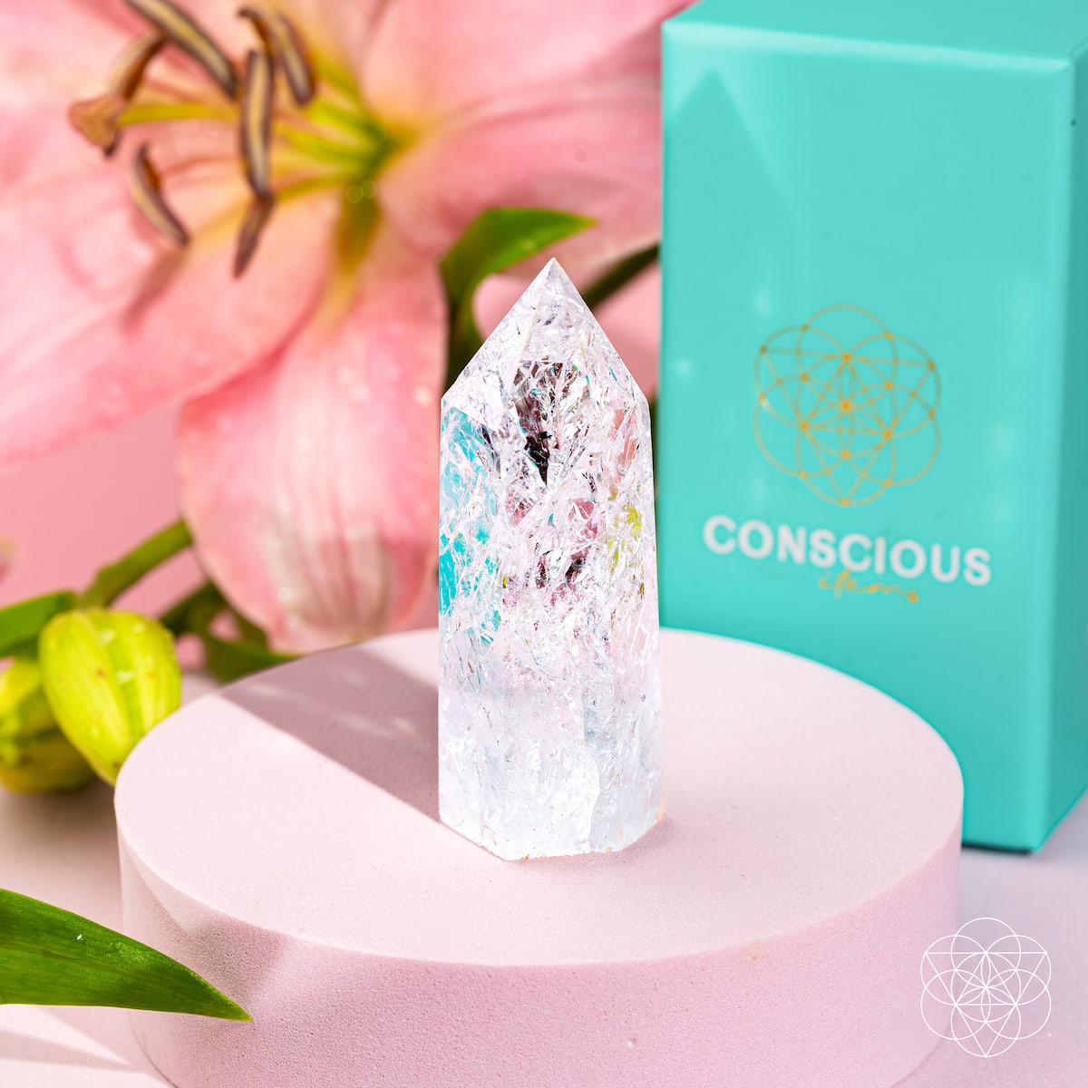 Ice quartz point home decoration by Conscious Items, showcasing a clear, crystalline quartz crystal specimen for positive energy.