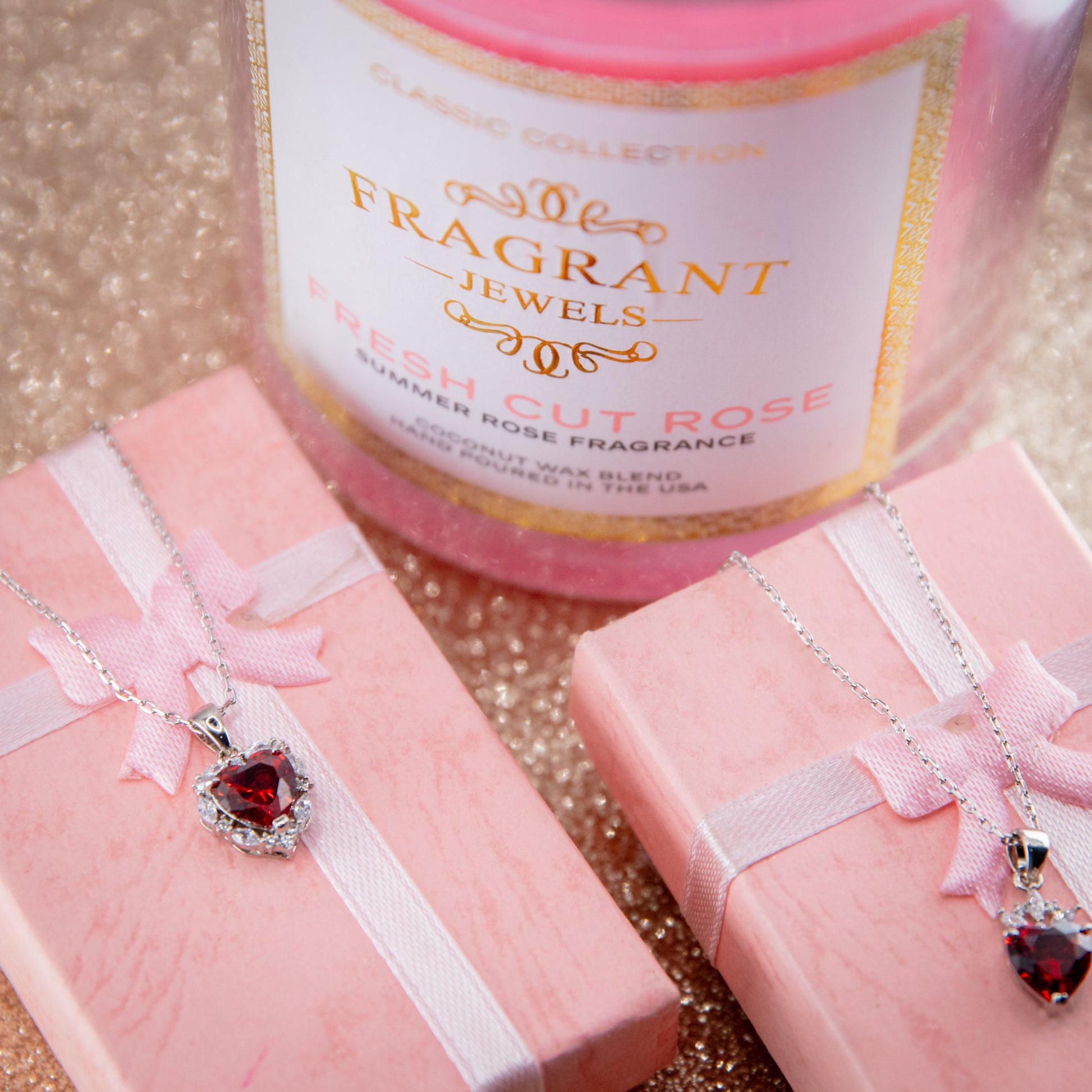 Jewel Candle Fragrant Jewels Fresh Cut Rose scented candle in a decorative glass jar with a rose design.