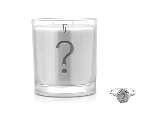 Mystery Candle With Jewelry - A Surprise Awaiting You featuring a candle and jewelry ring.