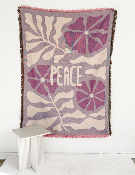 Elevated Faith peace throw blanket with soft fabric and peaceful design, perfect for cozying up on the sofa or bed.