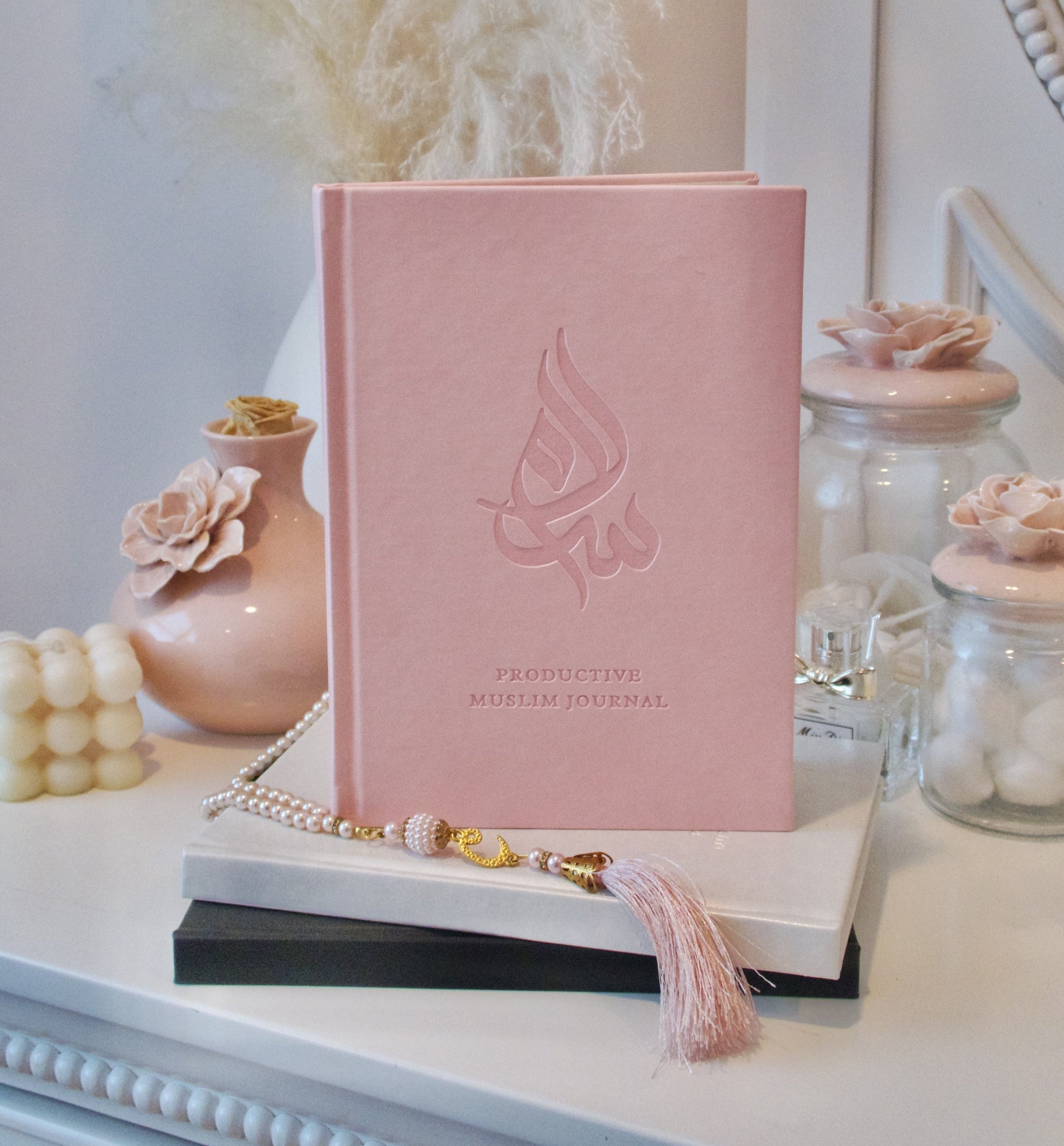 Pink Salam Journal, The Ultimate Muslim Journal by Salam Store, open with Islamic calligraphy and motivational quotes on pages.