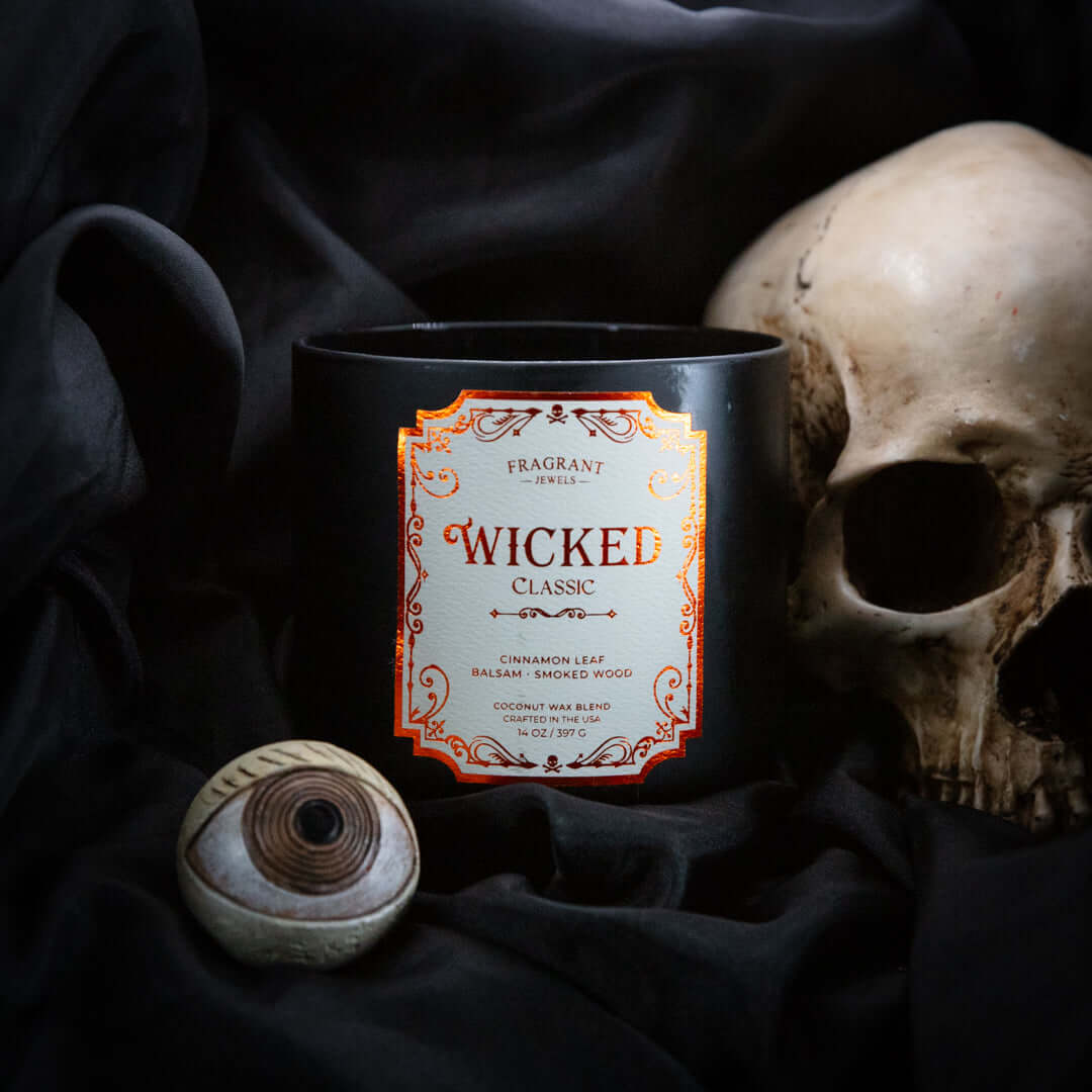Wicked Classic 2.0 - Jewel Candle featuring Cinnamon Leaf, Balsam, and Smoked Wood in a stylish black container.