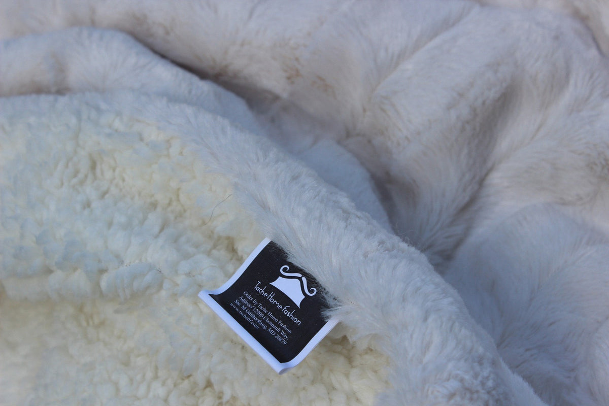 Tache White Ivory Polar Faux Fur with Sherpa Throw Blanket displayed folded, showcasing soft, plush texture and cozy design.