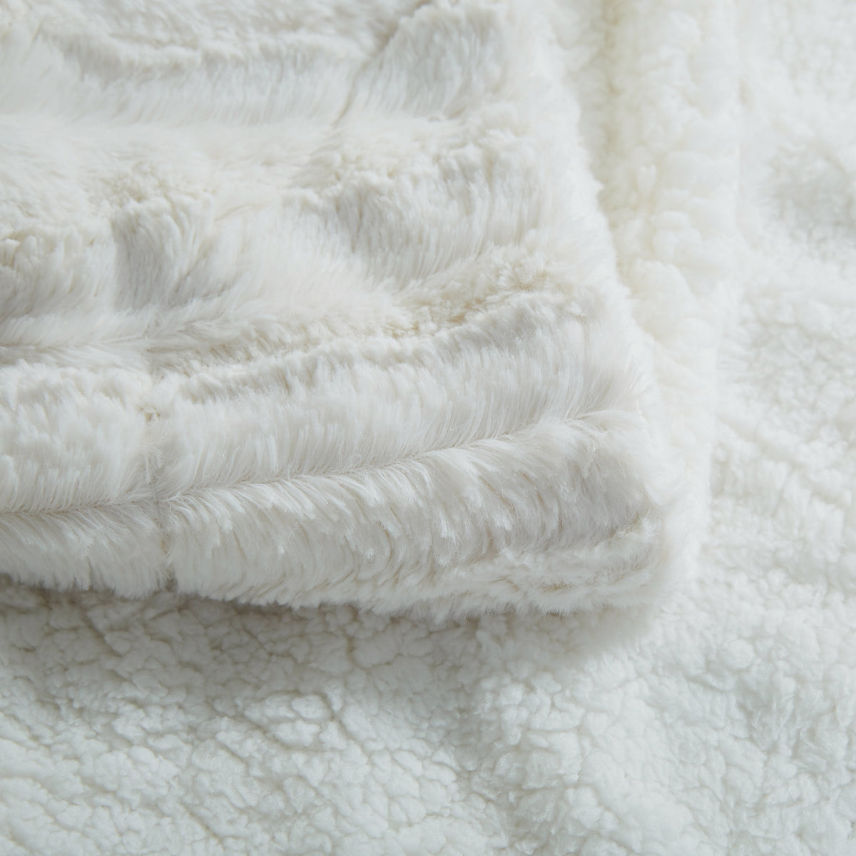 Tache White Ivory Polar Faux Fur and Sherpa Throw Blanket showcasing soft, plush texture and cozy design for warm comfort