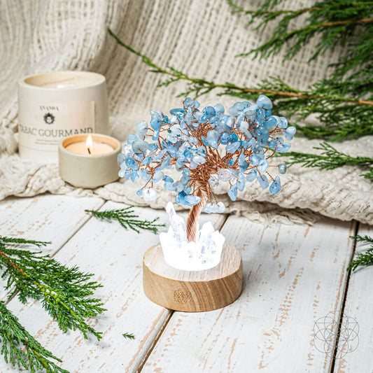 Aquamarine Guardian Angel Lamp of Protection night light by Conscious Items featuring a detailed angel and tree design for calming ambiance.